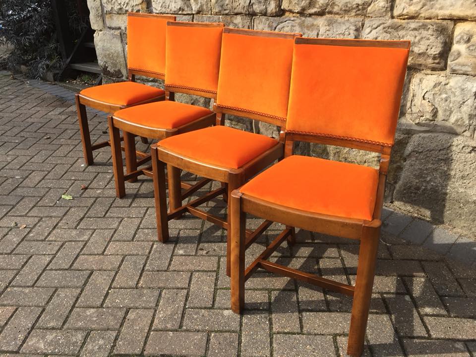40389405_2107946135885255_1416264778661232640_n Set of orange dining chairs