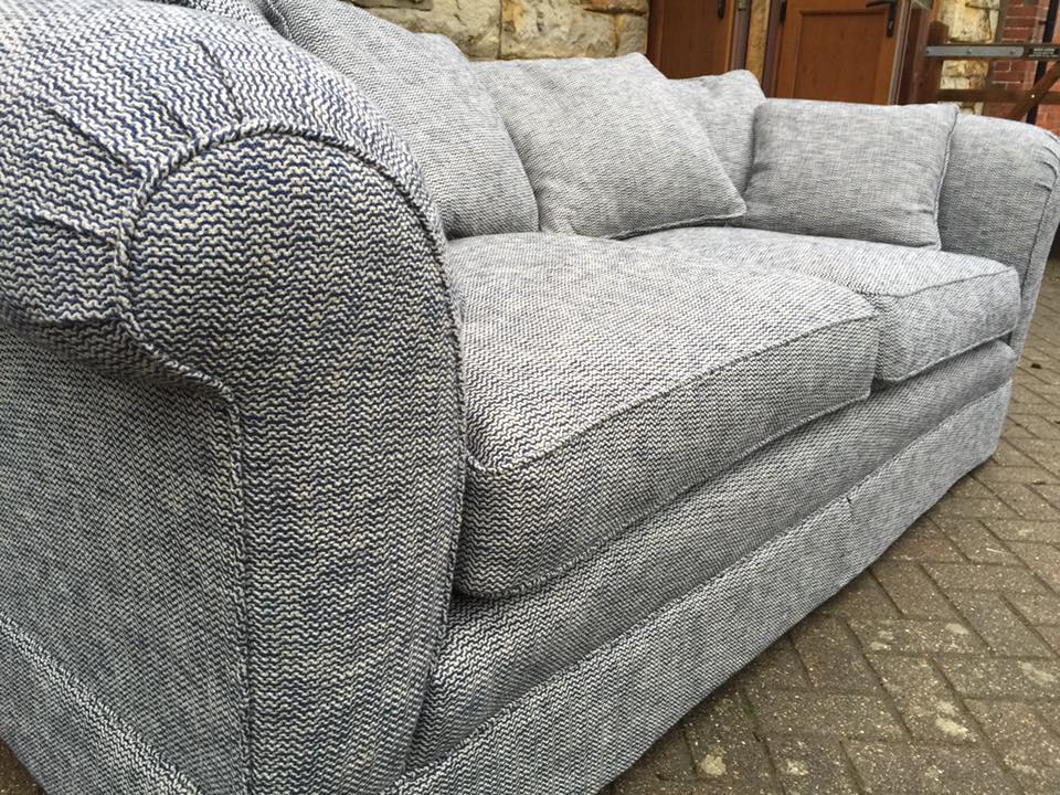 47137307_2236358779710656_479414029220052992_n Close up of grey patterned sofa
