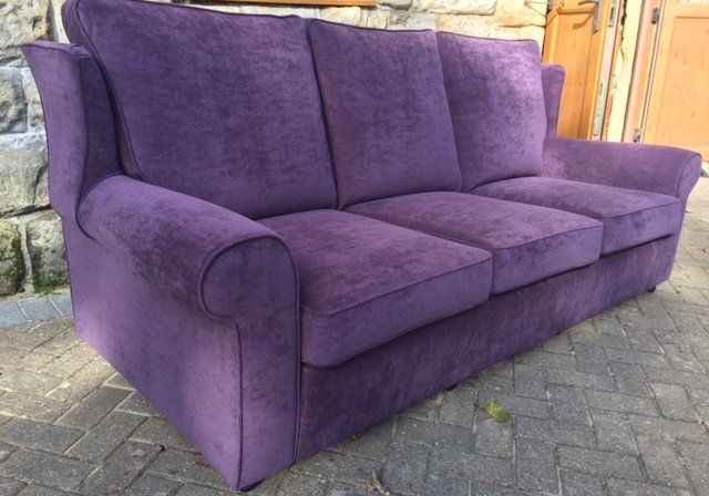 Plum coloured sofa