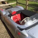 Grey car with red seats