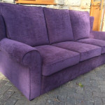 Plum coloured sofa