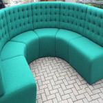Large round turquoise sofa