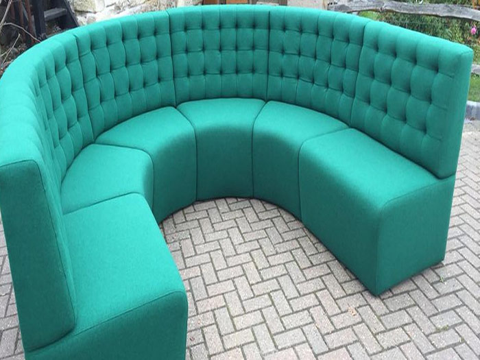 Large round turquoise sofa